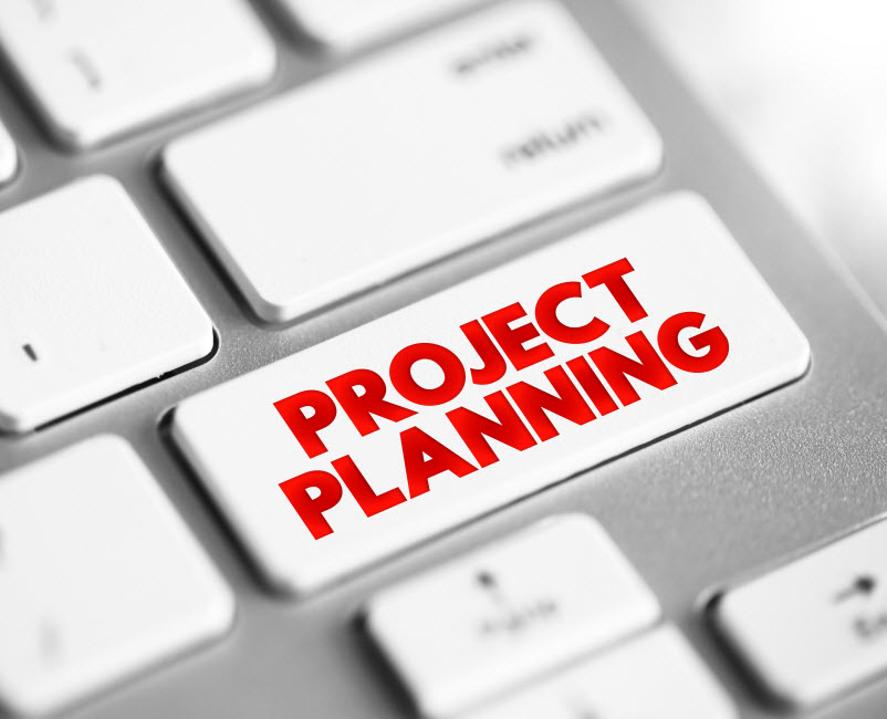 Project Planning word written in a keyboard